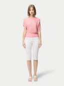 Women's Short Dolman Sleeve Cashmere Sweater Pink Icing  worn by model, front view on white background