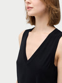 Black sleeveless cashmere dress on a white background. #color_graphite-black