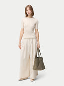 Women's Lace-Knit Cashmere Silk Top Whisper White  worn by model, front view on white backround