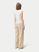 Women's Cashmere Silk Sleeveless Top Whisper White worn by model, back view on white backround