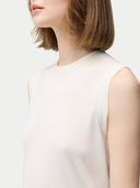 Women's Cashmere Silk Sleeveless Top Whisper White worn by model, detail view on white backround