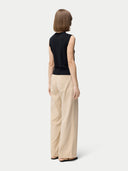 Women's Cashmere Silk Sleeveless Top Black worn by model, back view on white backround