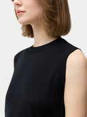 Women's Cashmere Silk Sleeveless Top Black worn by model, detail view on white backround