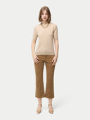 Women's C-Neck Cashmere Top Beige worn by model, front view on white backround #color_beige