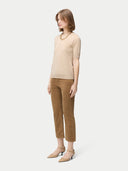 Women's Organic C-Neck Cashmere Top Beige worn by model, side view on white backround. #color_beige