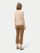 Women's Organic C-Neck Cashmere Top Beige worn by model, back view on white backround. #color_beige