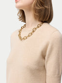 Women's Organic C-Neck Cashmere Top Beige worn by model, detail view on white backround. #color_beige