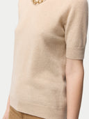 Women's Organic C-Neck Cashmere Top Beige worn by model, detail view on white backround. #color_beige
