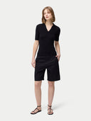 Cashmere Silk Women's Polo Shirt Black   worn by model, front view on white background