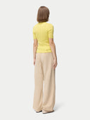 Women's Lace-Knit Cashmere Silk Top Blazzing Yellow worn by model, back view on white backround