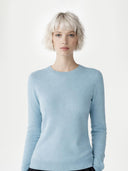 Women's Cloud Blue Cashmere Crewneck Sweate worn by model, detail view on white background
