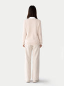 Women's Ivory White Cashmere Crewneck Sweater worn by model, back view on white background 