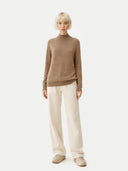 Women's Taupe Cashmere Mock Neck Sweater worn by model, front view on white background