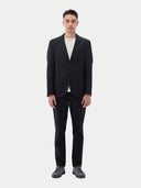 Men's Black single-breasted cashmere blazer worn by model, front view on white background