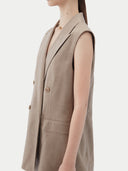 Cashmere vest with double-breasted design on a white background #color_taupe