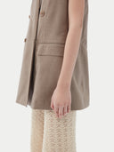 Cashmere vest with double-breasted design on a white background #color_taupe