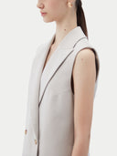 Detail of lapel and shoulder on the wind chime sleeveless vest, side angle