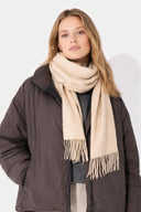 Cashmere Fringed Scarf Beige worn by model, detail view on white background