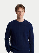 Men's Navy Cashmere Cable-Knit Sweater worn by model, detail view on white background