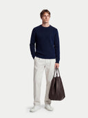 Men's Navy Cashmere Cable-Knit Sweater worn by model, front view on white background #color_navy-blue