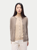Cashmere Crew Neck Button Cardigan Taupe worn by model, detail view, on white background