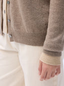 Cashmere Crew Neck Button Cardigan Taupe worn by model, detail view, on white background