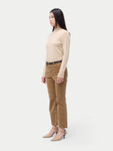 Essential Organic Cashmere Mock Neck Pullover Beige worn by model, side view, on white background