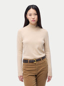 Essential Organic Cashmere Mock Neck Pullover Beige worn by model, detail view, on white background