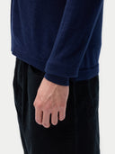 Men's Cashmere Silk Blend Polo-Neck Cardigan Navy worn by model, detail view on white background