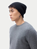 Cashmere Rib Knit Hat Black  worn by model, side view on white background