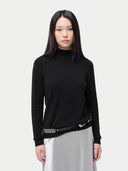 Essential Cashmere Mock Neck Sweater Black worn by model, detail view, on white background