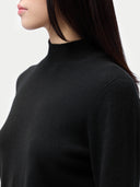 Essential Cashmere Mock Neck Sweater Black worn by model, detail view, on white background
