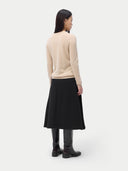 Cashmere Crewneck Sweater Beige worn by model, back view, on white background