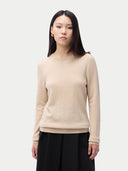 Cashmere Crewneck Sweater Beige worn by model, detail view, on white background
