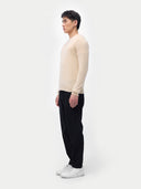 Men's Beige Cashmere Crewneck Sweater  woen by model side view on white background
