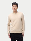 Men's Beige Cashmere Crewneck Sweater  woen by model detail view on white background