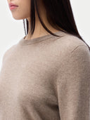 Cashmere Crewneck Sweater Taupe worn by model, detail view, on white background