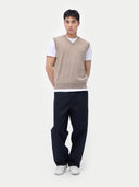 Men’s taupe cashmere vest worn by model, front view, on white background