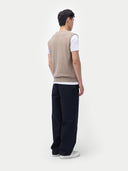 Men’s taupe cashmere vest worn by model, back view, on white background