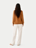 Women's Chipmunk Cashmere V-Neck Sweater worn by model, back view on white background 