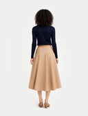 Timeless Cashmere Turtleneck Sweater Navy Blazer  worn by model, back view, on white background