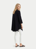 Women's Black Cashmere Button-Front Poncho  worn by model, back view on white background