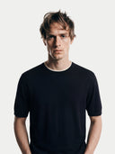 Men's Black Cashmere Silk Double-Collar T-Shirt worn by model, detail view on white background