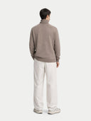 Men's Taupe Turtleneck Cashmere Sweater worn by model, back view on white background