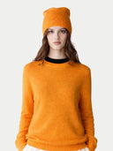 € 99 Cashmere Hat & Sweater Set Apricot worn by model, detail view on white background