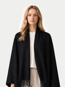 Cashmere Large Blanket with Fringe Black   worn by model, detail view on white background