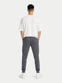 Men's Cashmere Jogger Plum Kitten  worn by model, back view on white background