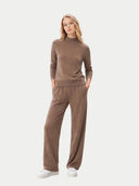 Timeless Cashmere Turtleneck Sweater Taupe worn by model, front view, on white background