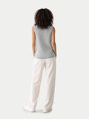 Ajour Knit Crewneck Cashmere Vest High Rise worn by model, back view on white backround