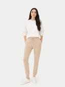 Women's Cashmere Cuffed Jogger Beige  worn by model, front view on white background